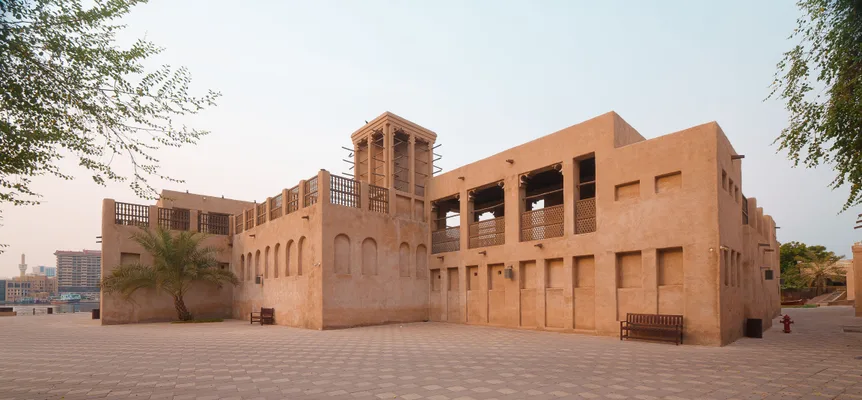 Wind towers and sand-coloured walls in Dubai's Al Fahidi quarter